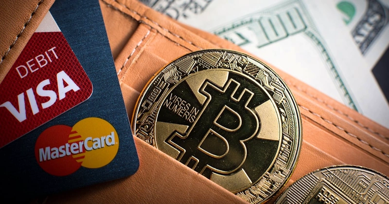 Visa and Mastercard gift cards with cryptocurrency symbols BTC, LTC, ETH, XMR, DOGE